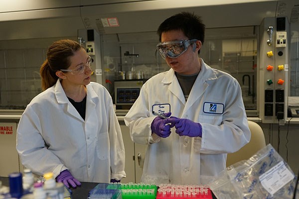 Amy Peterson and student in lab