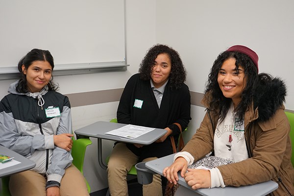 Nicole Villafana, right, and two other students from Lawrence High visited the UMass Lowell campus to consider careers in education