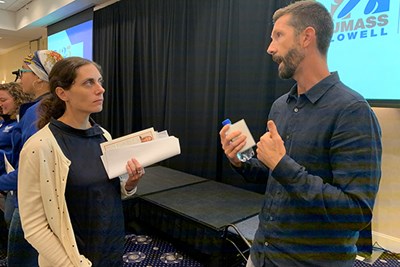 Juliette Berg, a senior researcher at the American Institutes for Research, speaks with UMass Lowell Asst. Prof. of Education Jack Schneider
