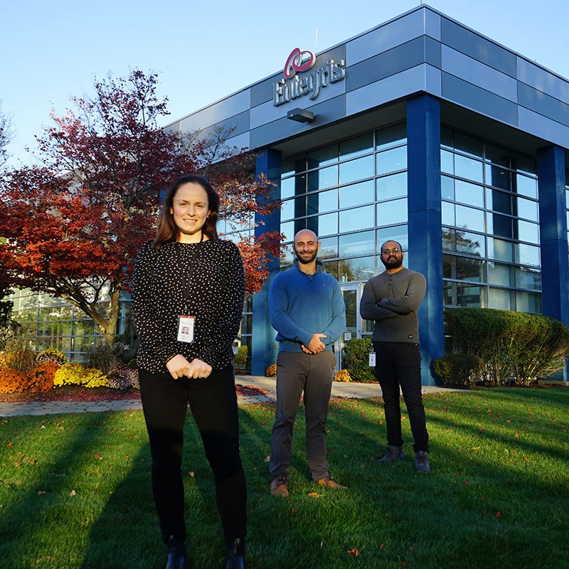 Julie Doyle, Greg Dorian and Anish Chorghe outside Entegris global headquarters in Billerica.