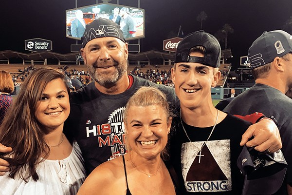 The Epperson family on the field after the Red Sox' World Series win