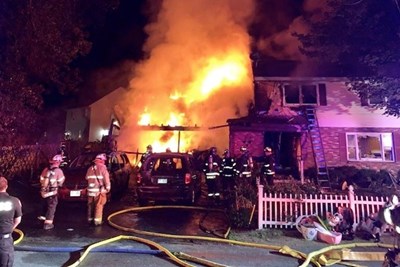 Tyngsboro firefighters battle a burning blaze