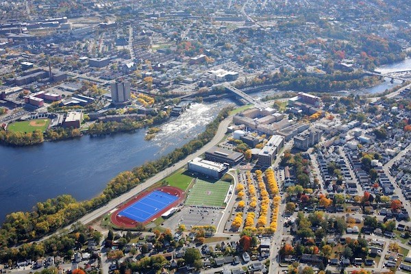 An aerial view of the UML campus with the Merrimack River