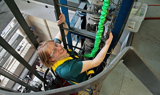 Female-student-climbing-up-structure-nuclear-reactor-550-opt.jpg
