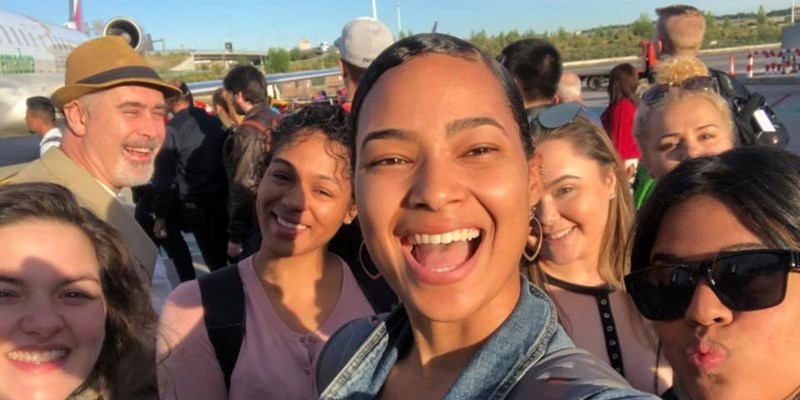 Franchesca Arias takes a selfie in Spain during her study abroad program with a group of students and Assoc. Teaching Prof. Thomas Piñeros-Shields