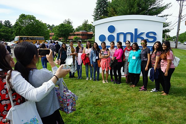 Students from India take a photo during a visit to MKS Instruments in Methuen