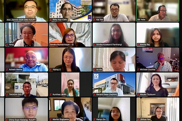 A screenshot of people on Zoom