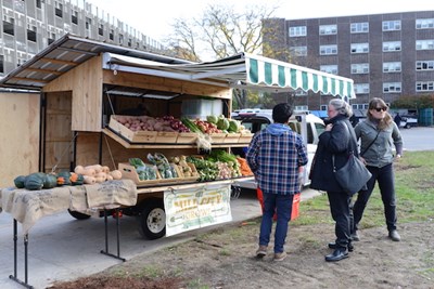People check out the Mill City Grows mobile market