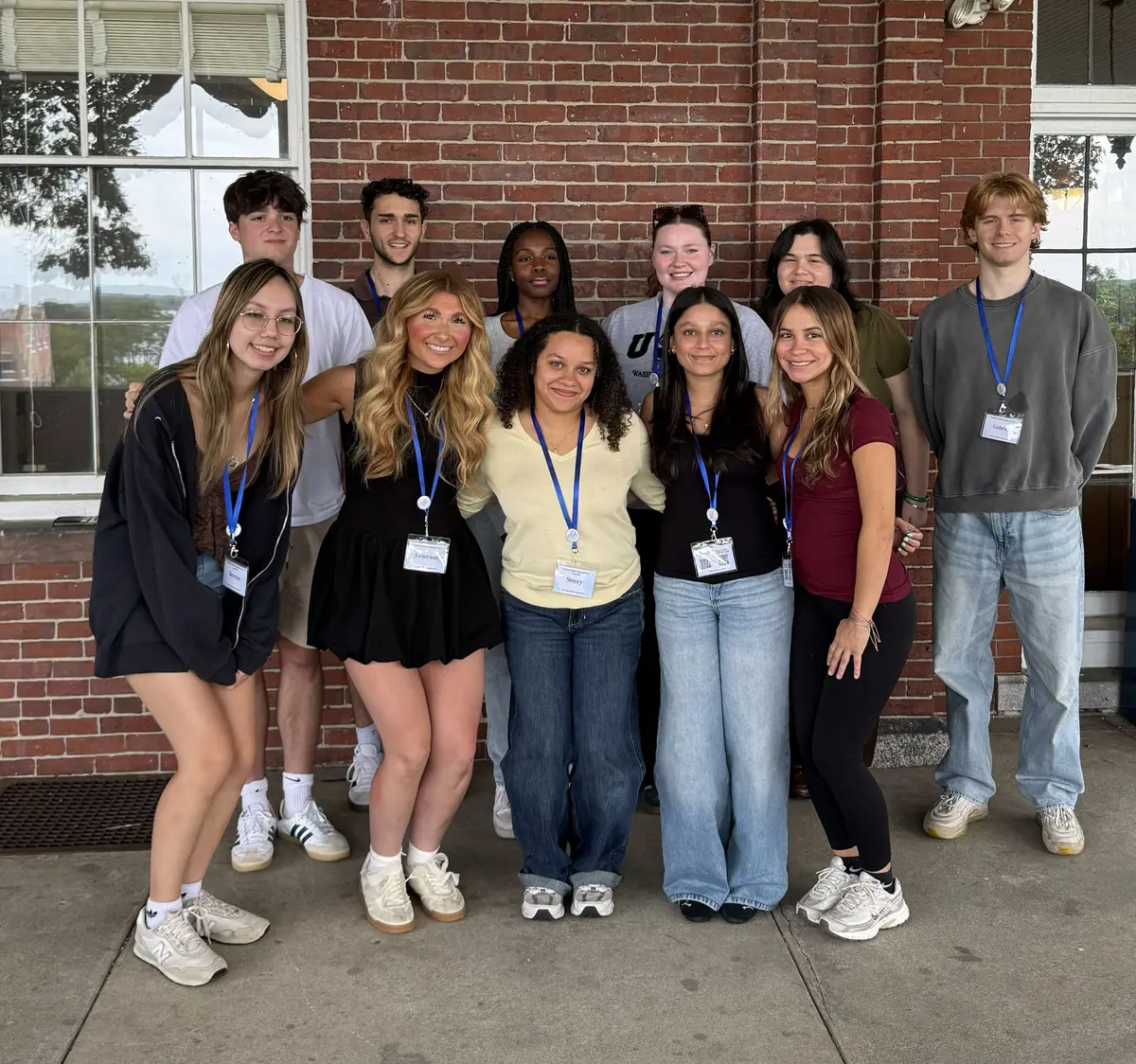 Students gathered on verandah for group photo.
