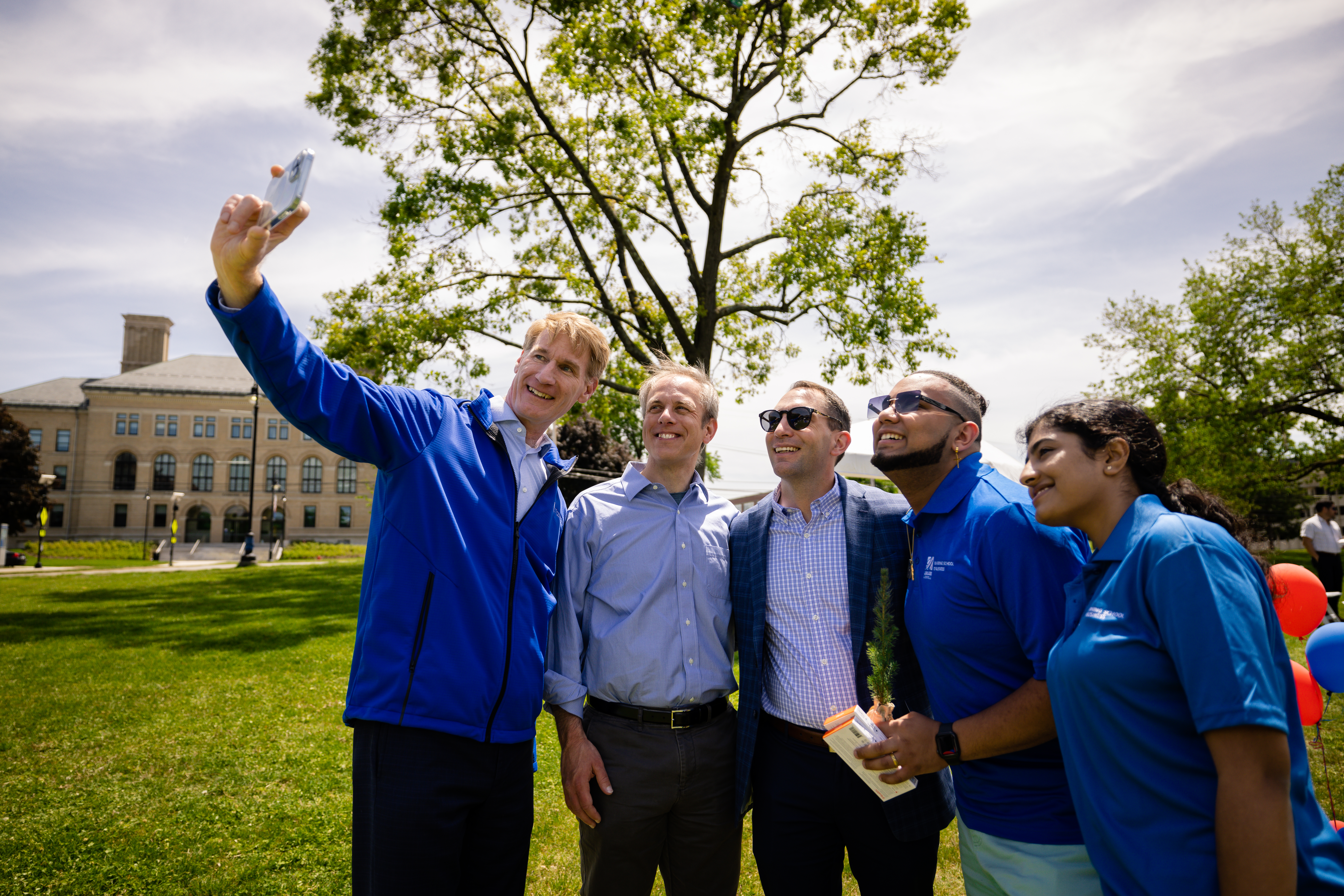Faculty and Staff taking a selfie at the Faculty & Staff BBQ, May 2022