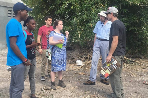 UMass Lowell Civil and Environmental Engineering students Kayla Dooley and Paul Salibe on site in Les Cayes, Haiti for their alternative capstone project designing sanitation systems for houses