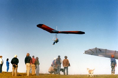 A student flies a hang glider