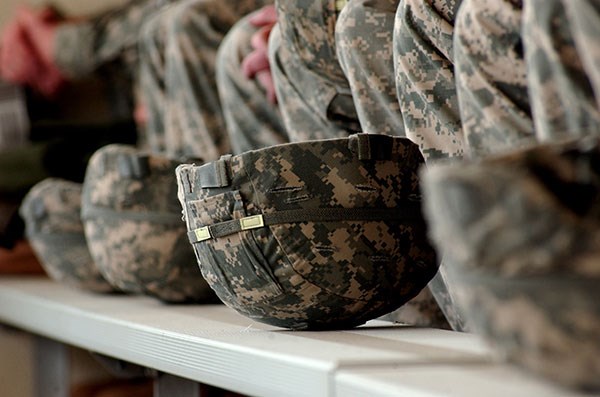 A row of military helmets.