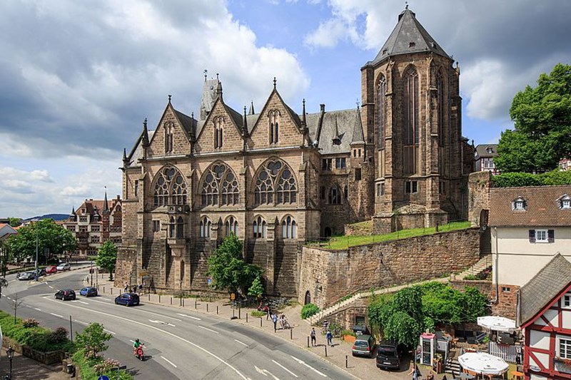 Hessen campus showing an old gothic looking building.