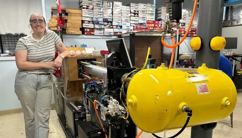 Imogen O'Brien poses in an engineering lab.
