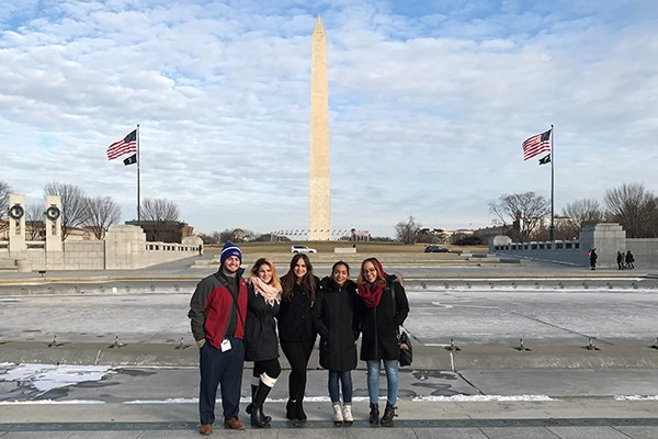 Five UML students visited the World War II memorial in Washington D.C.