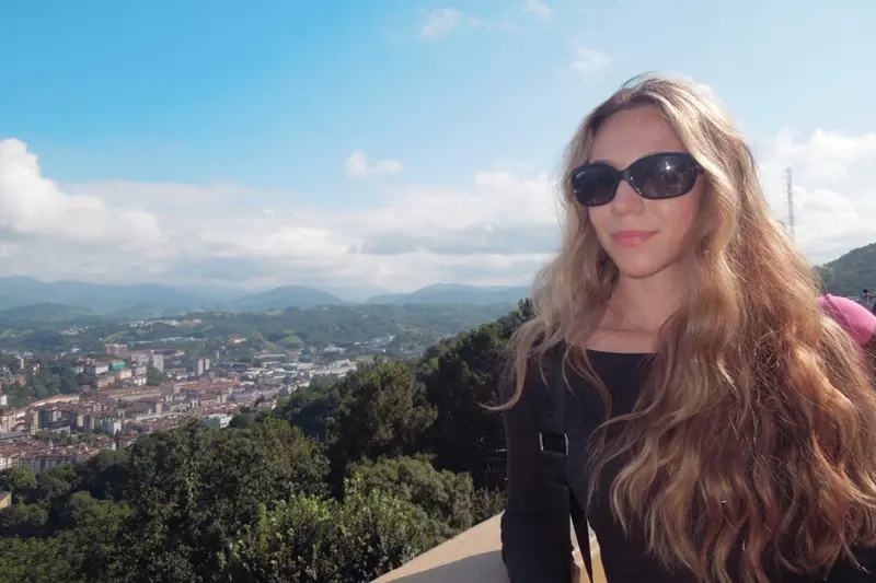 Jesse Friedman poses while traveling in San Sabastian, Spain on top of Mount Igueldo.