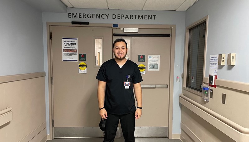 Jose Archila Quezada in front of Emergency Room doors