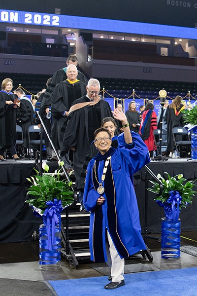 Julie Chen waving at Convocation