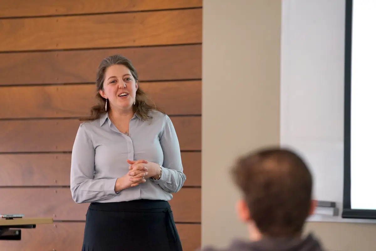 Kate DiTullio speaking to another person.