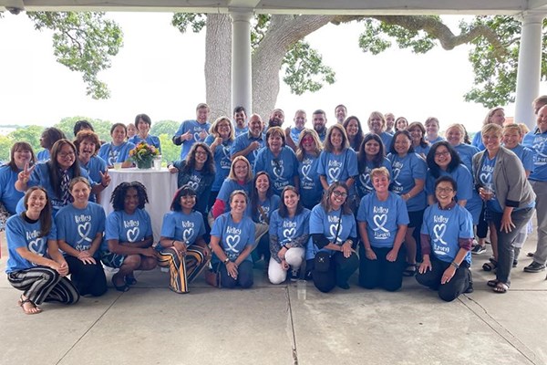 Staff from Academic and Student Services wearing Kelley Strong T-shirts