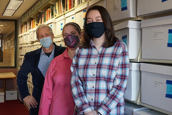 UMass Lowell libraries archivist and head of special collections Anthony "Tony" Sampas, library special collections assistant Carisa Kolias, and history student Brianne Puls in the Kerouac Archives