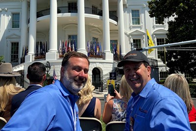 Al Contarino and George Peters outside the White House