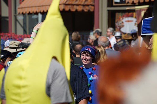 Team member Jacqui Gallant and a man in a banana costume wait for the race to start