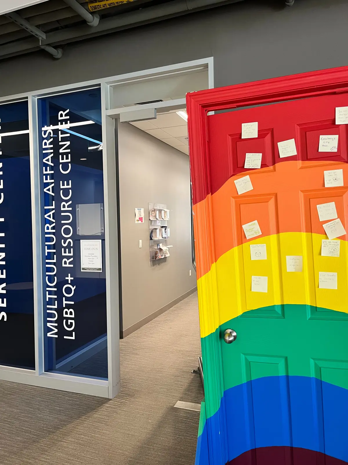 Door of lesbian, gay, bisexual, transgender, questioning or queer+ resource center.