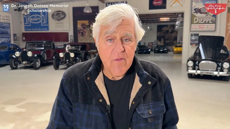 Jay Leno inside his automotive garaage