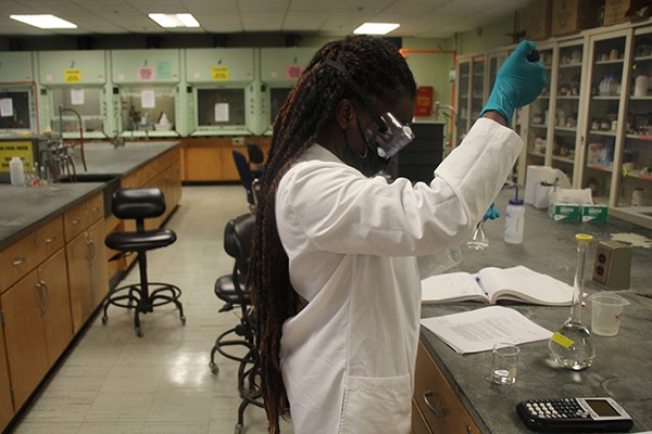 Biology major Benedicta Agyemang-Brantuo in the lab at UML