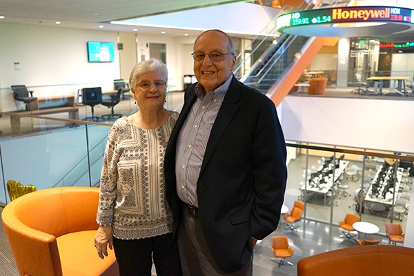 Alum Ron Cannistraro and his wife Carol pose in the new business school