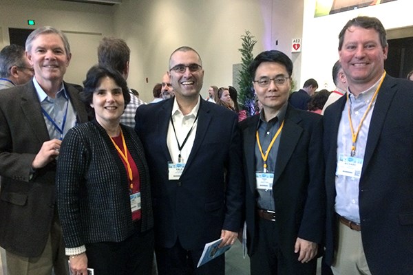 University staff and faculty with Salesforce's Vala Afshar at the Salesforce Boston World Tour event