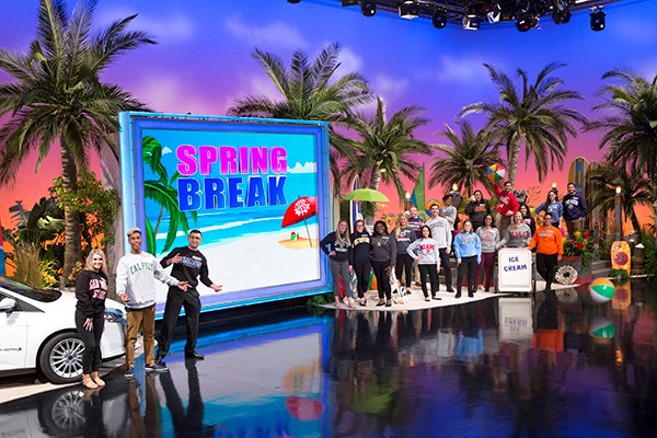 UML honors student Mansour Chaya in a promo photo for "Wheel of Fortune" College Week Spring Break 2018