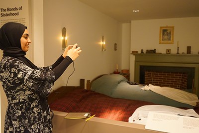 Marway El-Garawany of Egypt takes a photo of a boardinghouse bedroom at LNHP