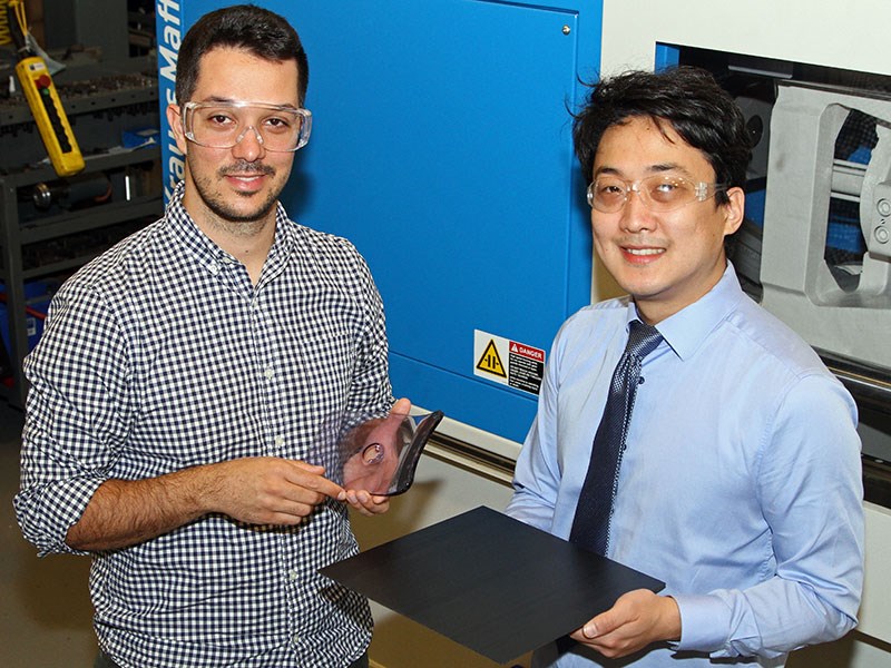 Plastics Engineering Asst. Profs. Jay Hoon Park, right, and Davide Masato