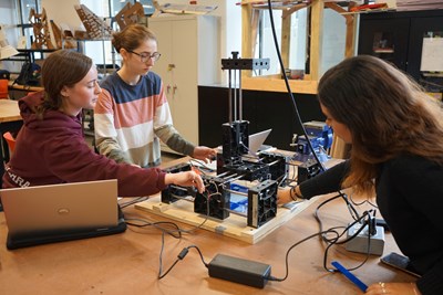 Mechanical Engineering students collaborate on their computer numerical control machine