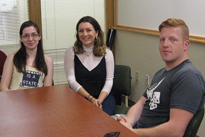 Three undergraduates on the fourth-place mediation team