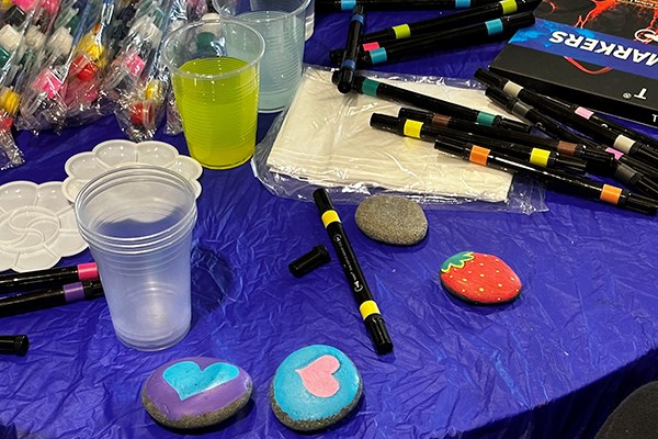 Kindness rocks painted with hearts and art supplies for making them