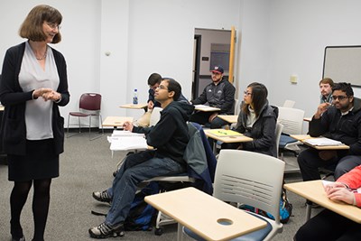 UML Economics Chairwoman Monica Galizzi teaches a class