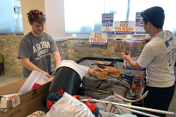 Student volunteers pick up donations at the ICC