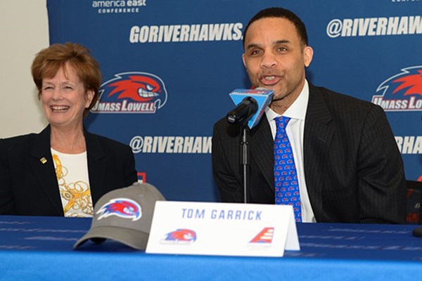 Tom Garrick speaks at his introductory press conference alongside Chancellor Jacquie Moloney