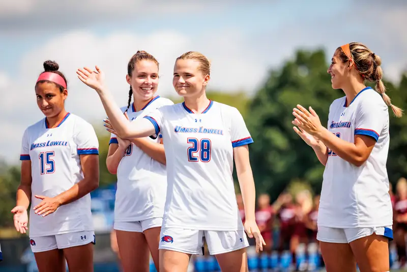 Nadja Andersen with three other athletes from the UMass Lowell women's soccer team.