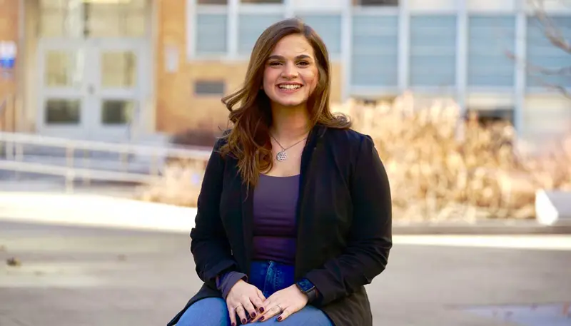Nardine Faheem seated outdoors 