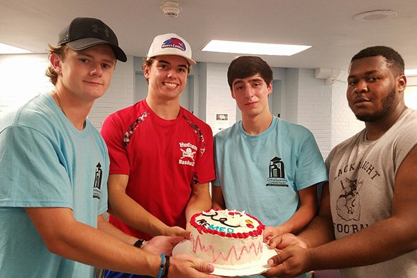Members of the Pre-Med LLC decorated a cake together their first week on campus.