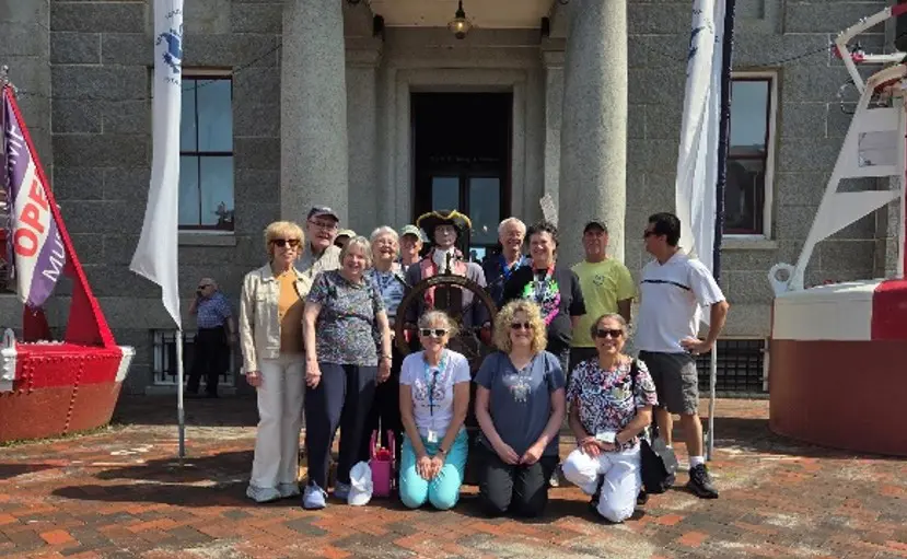 Members gather in front of the Customs House Museum in Newburyport.