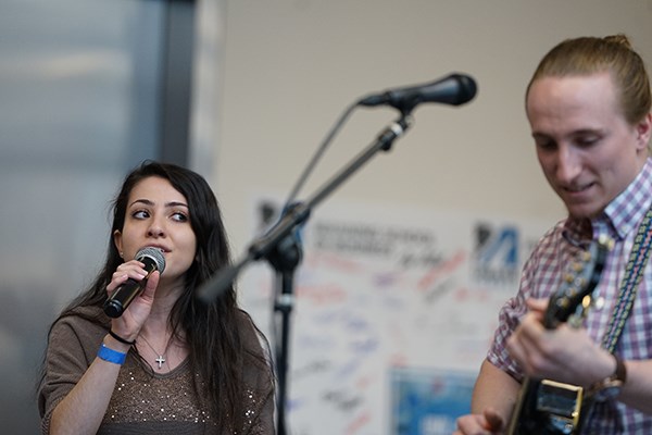 Nicole Hayek sings during the Manning School's Days of Giving