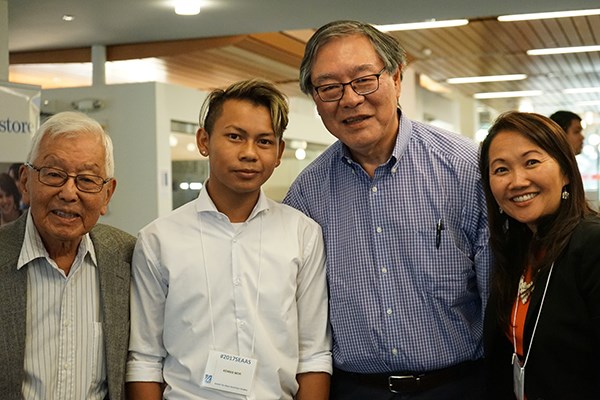 Scholarship recipient Kennis Mor with, from left, Yutaka Kobayashi, UMass Boston Prof. Paul Watanabe and UML Assoc. Prof. Phitsamay Uy