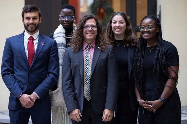 UML psychology major Chioma Opara, right, with three other Future Nobel Laureate Scholars on her health inequities team and a faculty advisor