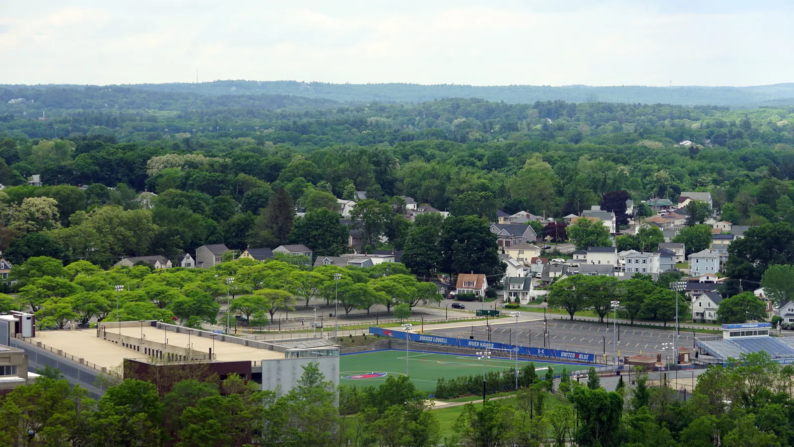 Aerial of north campus at umass lowell with field in foreground
